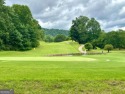 Picturesque 1.29-acre lot overlooks the 12th green, featuring a for sale in Hayesville North Carolina Clay County County on GolfHomes.com