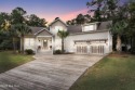 Discover extraordinary craftsmanship in this custom home on the for sale in Leland North Carolina Brunswick County County on GolfHomes.com