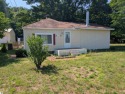 Charming Home Just 15 Minutes from Traverse City!  This for sale in Interlochen Michigan Grand Traverse County County on GolfHomes.com