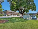 Beautifully upgraded 2BR/2BA corner unit on desirable first for sale in Tequesta Florida Martin County County on GolfHomes.com