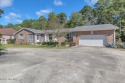 This 4-bedroom ranch sits on just under a half of an acre in for sale in Shallotte North Carolina Brunswick County County on GolfHomes.com