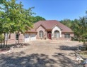 Custom Craftsman-style home with an open floor plan, cathedral for sale in Hot Springs Village Arkansas Saline County County on GolfHomes.com