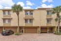 Welcome to this spacious three-story townhouse-style condo in a for sale in Treasure Island Florida Pinellas County County on GolfHomes.com