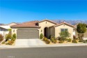 Nestled in the vibrant, 55+ community of Altis, this stunning for sale in Beaumont California Riverside County County on GolfHomes.com