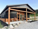 Newer Construction Home built in 2024, Golf Course Frontage on for sale in Bellaire Michigan Antrim County County on GolfHomes.com
