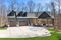 Experience refined mountain living in this custom-built for sale in Dahlonega Georgia Lumpkin County County on GolfHomes.com