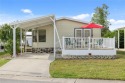Your slice of paradise awaits with this 1989 2/2 Doublewide for sale in North Port Florida Sarasota County County on GolfHomes.com