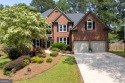 Welcome to this stunning home located in the highly desirable for sale in Woodstock Georgia Cherokee County County on GolfHomes.com