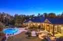 The magnificent footprint of this Hawks Ridge estate impresses for sale in Ball Ground Georgia Cherokee County County on GolfHomes.com