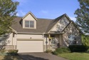 Framed by mature trees and green space, this Hamptons at for sale in Powell Ohio Delaware County County on GolfHomes.com