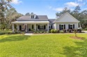 Welcome to effortless Lowcountry living! This better than new for sale in Townsend Georgia Mcintosh County County on GolfHomes.com