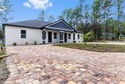 Welcome to this one-of-a-kind new construction duplex in Citrus for sale in Citrus Springs Florida Citrus County County on GolfHomes.com