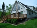 Pride of ownership is evident in this beautifully maintained for sale in Wolverine Michigan Cheboygan County County on GolfHomes.com