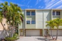 Welcome to The Village of Paradise Island, a luxury townhome for sale in Treasure Island Florida Pinellas County County on GolfHomes.com