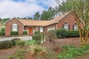 Charming all-brick home located in the gated and golf community for sale in Sanford North Carolina Lee County County on GolfHomes.com