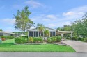 This open and spacious 2 bdrm/ 2 bath home features laminate & for sale in Port Saint Lucie Florida Saint Lucie County County on GolfHomes.com