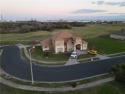 Custom home w/Texas Hill Country flair on golf course.  No for sale in Portland Texas San Patricio County County on GolfHomes.com