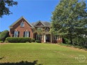 Timeless elegance in The Georgia Club! Welcome to this stately for sale in Statham Georgia Barrow County County on GolfHomes.com