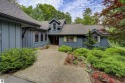 Nestled on an incredibly rare, private 2.47 wooded acres in for sale in Leland Michigan Leelanau County County on GolfHomes.com