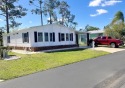 Completely remodeled 1987 Redmen residence with 2 beds, 2 baths for sale in N. Fort Myers Florida Lee County County on GolfHomes.com