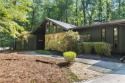Welcome to this beautiful mid-century ranch-style house located for sale in Johns Creek Georgia Fulton County County on GolfHomes.com