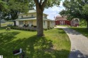 Step into the charm of Northern Michigan and a Slice of Bellaire for sale in Bellaire Michigan Antrim County County on GolfHomes.com
