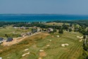 Discover an exceptional opportunity to build your dream home on for sale in Williamsburg Michigan Grand Traverse County County on GolfHomes.com