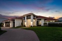 Discover a truly unique and inviting home, meticulously crafted for sale in Boca Raton Florida Palm Beach County County on GolfHomes.com