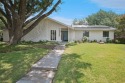 Located in Brookhaven Golf Course Community, this beautiful for sale in Farmers Branch Texas Dallas County County on GolfHomes.com