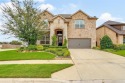 Stunning former model home in the Park of Fossil Creek community for sale in Fort Worth Texas Tarrant County County on GolfHomes.com