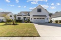 Welcome to this stunning residence nestled in the prestigious for sale in Leland North Carolina Brunswick County County on GolfHomes.com