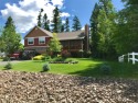 Stunning 4-bedroom, 3.5-bath multi-level home nestled in the for sale in Columbia Falls Montana Flathead County County on GolfHomes.com