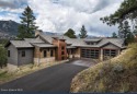 Welcome to the enchanting ''Sunset Ranch,'' an exquisite haven for sale in Sandpoint Idaho Bonner County County on GolfHomes.com