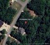 Build your dream home on this beautiful 0.35-acre wooded lot in for sale in Coinjock North Carolina Currituck County County on GolfHomes.com