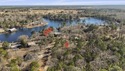 Rare Lakefront Opportunity - 3 Lots Total! Discover the perfect for sale in Lumberton Mississippi Pearl River County County on GolfHomes.com