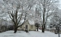 This quaint home is a time capsule, nice floor plan with huge for sale in Kalispell Montana Flathead County County on GolfHomes.com