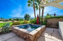 Exquisitely upgraded Maree plan located behind the private gates for sale in La Quinta California Riverside County County on GolfHomes.com