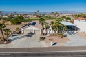 Welcome to this spacious 3-bedroom, 2-bathroom home with 1,826 for sale in Lake Havasu City Arizona Mohave County County on GolfHomes.com