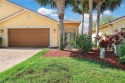 Welcome to Vistana Villas! This beautifully updated attached for sale in Lehigh Acres Florida Lee County County on GolfHomes.com