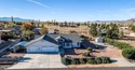 Welcome home to this beautifully updated, pride-of-ownership for sale in Kingman Arizona Mohave County County on GolfHomes.com