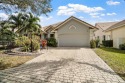 Charming 3-bedroom, 3-bathroom home in the desirable Eagle Trace for sale in Coral Springs Florida Broward County County on GolfHomes.com