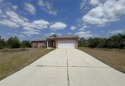 Beautiful corner lot POOL home on over a quarter acre with NO for sale in Port Charlotte Florida Sarasota County County on GolfHomes.com