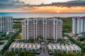 This Tuscany inspired 3-bedroom, 3-bath luxury tower residence for sale in Naples Florida Collier County County on GolfHomes.com