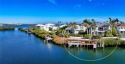 Courtyard residences in Queens Harbour are a rare find, and this for sale in Longboat Key Florida Sarasota County County on GolfHomes.com