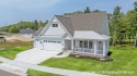Welcome to your dream home nestled within the serene landscape for sale in Muskegon Michigan Muskegon County County on GolfHomes.com