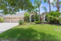 Discover luxury living in this meticulously maintained 4-bedroom for sale in Land O' Lakes Florida Pasco County County on GolfHomes.com