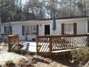 Cozy Doublewide Home with 3 bedrooms, 2 bathrooms. Split floor for sale in Bracey Virginia Mecklenburg County County on GolfHomes.com