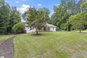 Welcome home to this expansive 4000 sqft farmhouse retreat for sale in Taylors South Carolina Greenville County County on GolfHomes.com