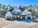 Welcome to a stunning home with beautiful lake views in the for sale in Sanford North Carolina Harnett County County on GolfHomes.com