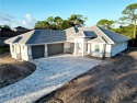 BRAND NEW CONSTRUCTION - Ideally situated behind the 10th green for sale in Palm City Florida Martin County County on GolfHomes.com